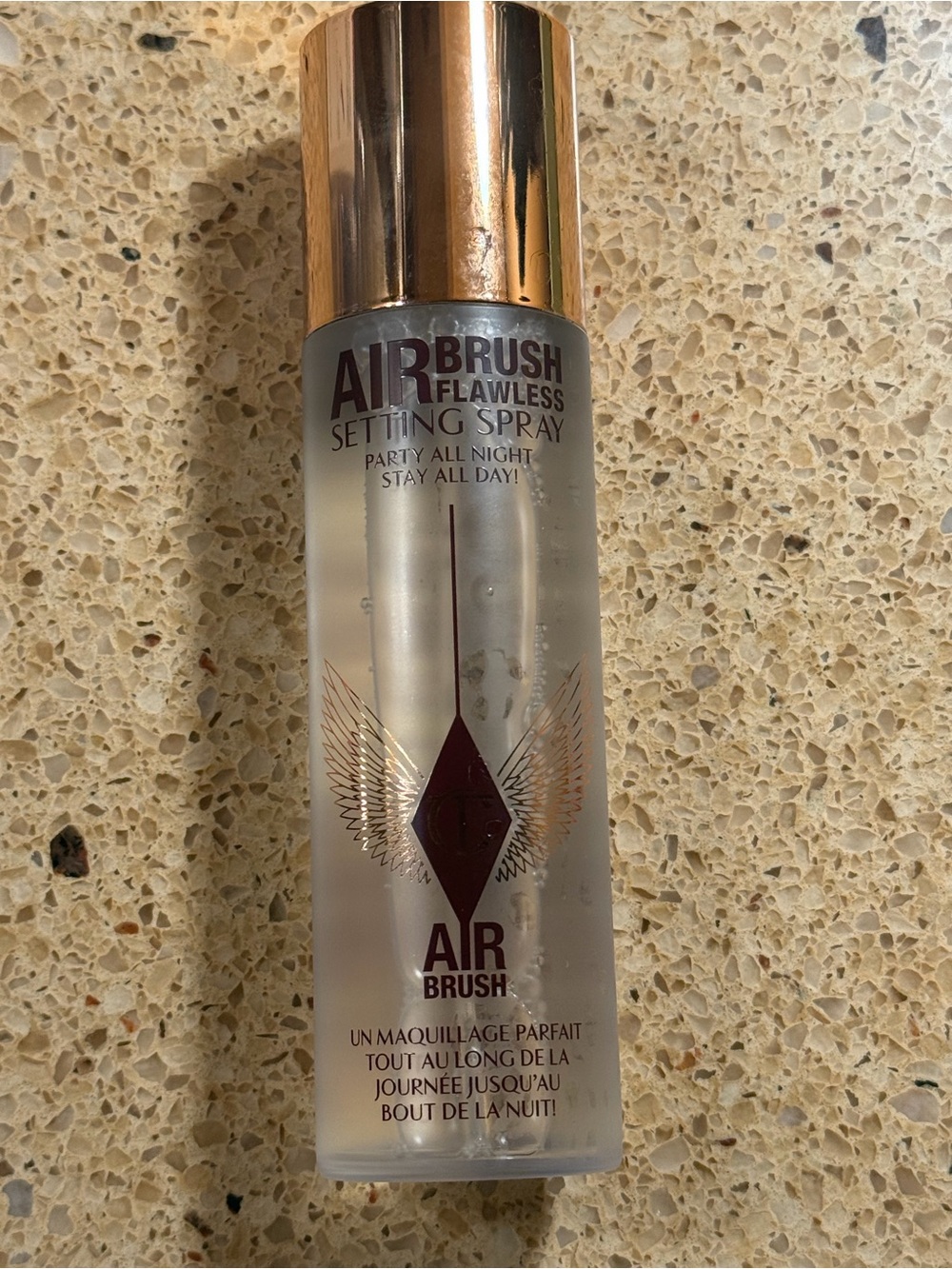 Charlotte Tilbury Airbrush Flawless Setting Spray — Gold Cap, Clear Bottle